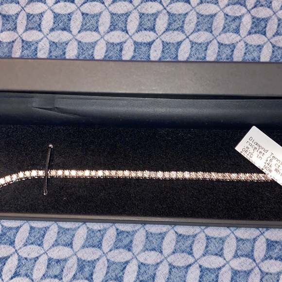 diamond tennis bracelet is set in elegant 14k white gold. - Picture 6 of 10